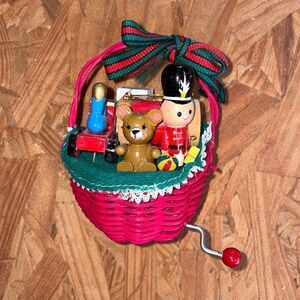 Vtg red basket of Christmas toys wind up music box